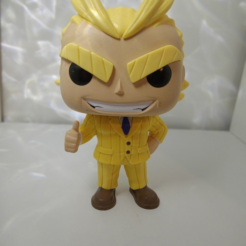 Yellow and Brown Vinyl Figure